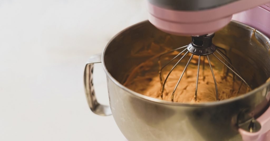 an image of the best stand mixer mixing a batter